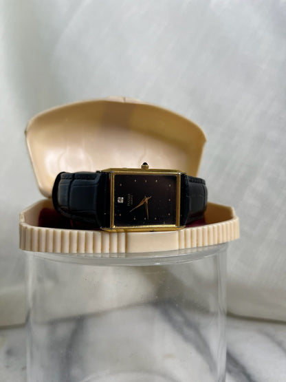 Vintage gold-tone Pulsar Quartz with Black Dial and Black Leather Band